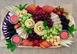 Cheese and fruit board with cheeses, fruit and preserves to feed 12-15 as appetizer portions. The Big Bash.