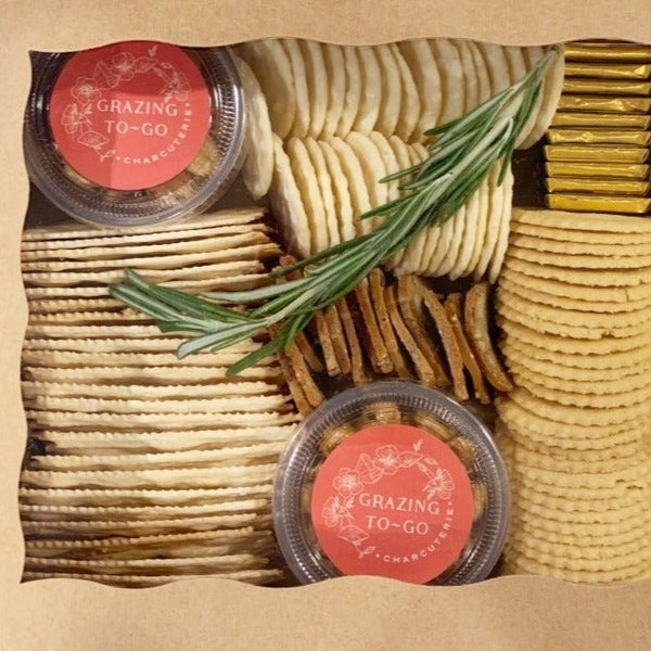 Add on box of assorted crackers and breads with rosemary sprig in a craft box.
