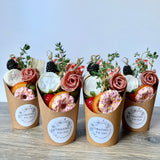 Charcuterie cups with meat, cheeses, fruit, nuts, olives, pickles and accompaniments in a single-serve cup. 14 oz. option.