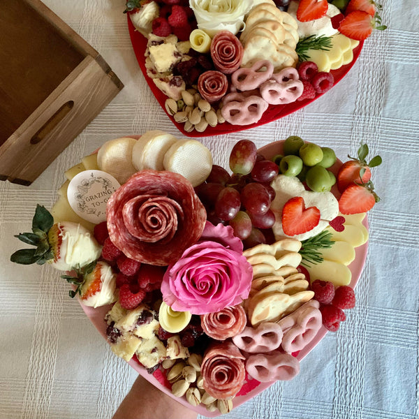 Charcuterie meats, cheeses, fruit, nuts, olives, pickles and accompaniments on a heart-shaped platter to keep. Serves 3-4 as appetizer portions. The Keepsake for Valentine's Day.